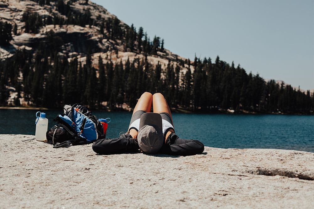 Laying on granite at Cathedral Lake in Yosemite National Park